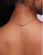 hina short gem necklace in gold plated with green jewels