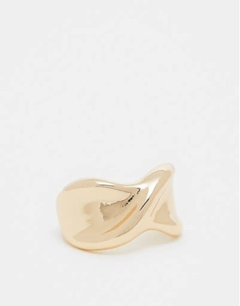 ring with twist design in gold tone