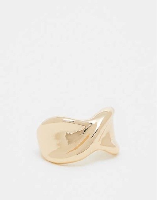 ring with twist design in gold tone