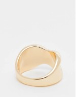 ring with twist design in gold tone