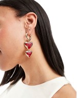 drop earrings with red heart detail in gold tone