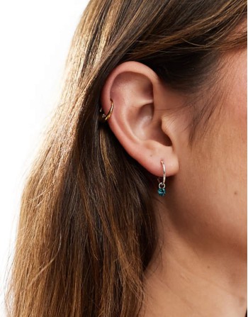 hoop earrings with bright blue crystal charm in sterling silver