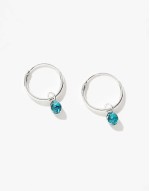 hoop earrings with bright blue crystal charm in sterling silver