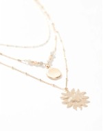 layered sun necklace in gold