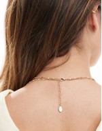 layered sun necklace in gold