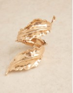 Limited Edition cuff bracelet with wrap around leaf detail in gold tone