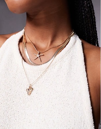 seacharm multirow necklace with starfish pendant in gold