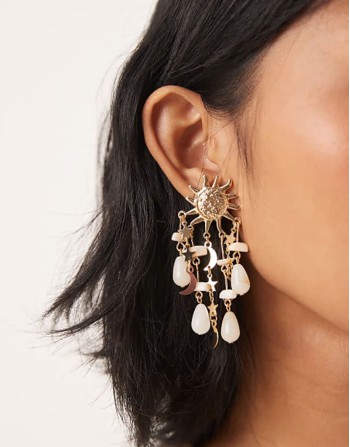 drop earrings in sun design with bead detail in gold tone
