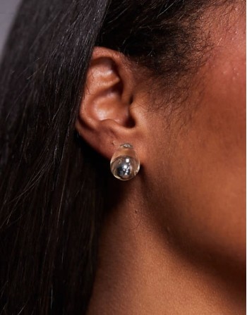 stud earrings with clear resin detail in silver tone