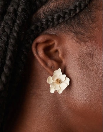 stud earrings with matte floral detail in white