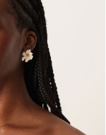 stud earrings with matte floral detail in white