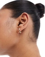 hoop earrings with twisted huggie detail in gold tone