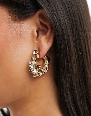 hoop earrings with textured gold tone