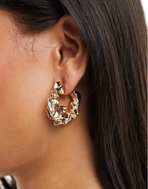 hoop earrings with textured gold tone
