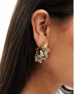hoop earrings with textured gold tone